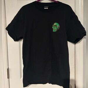 Black Creature T-Shirt with Green Skull Design